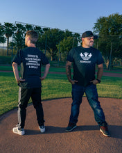 Load image into Gallery viewer, TheGuyWhoDancesOnCongress Trefoil TGWDOC Logo Tee (White Ink on Black Shirt)