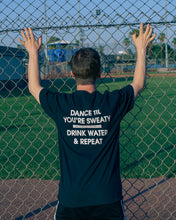 Load image into Gallery viewer, TheGuyWhoDancesOnCongress Trefoil TGWDOC Logo Tee (White Ink on Black Shirt)