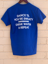 Load image into Gallery viewer, TheGuyWhoDancesOnCongress Trefoil TGWDOC Logo Tee (White Ink on Blue Shirt)