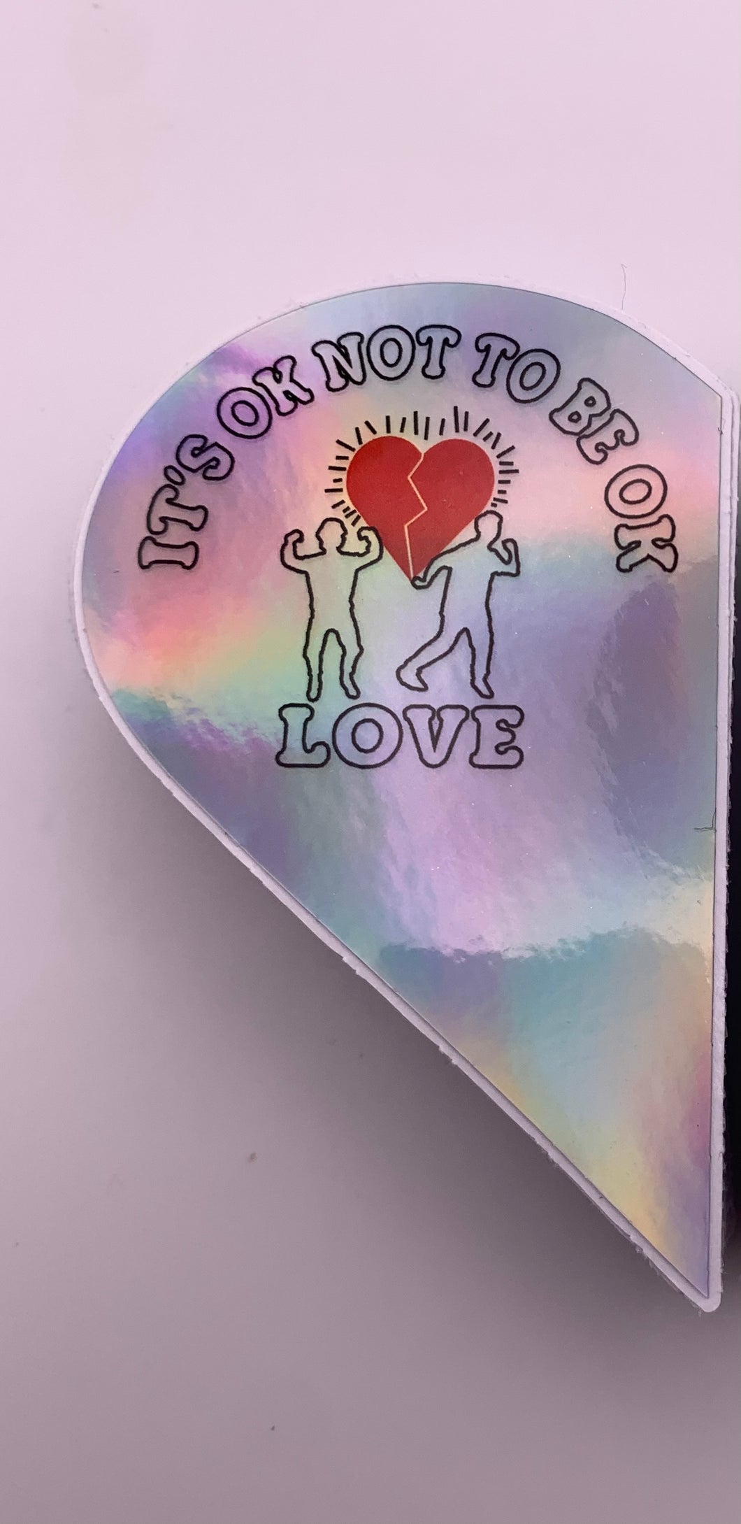 It’s Ok Not To Be Ok (Half-A-Heart Holographic Sticker) 2 X 3”